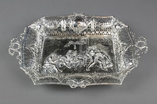 A 19th Century Continental repousse and pierced rectangular 2 handled dish decorated with a revelling scene and vacant cartouches, approx 20 ozs 