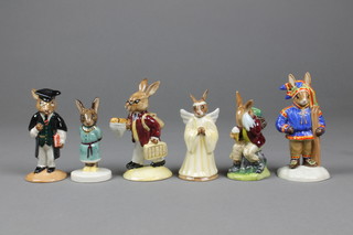 6 Royal Doulton Bunnykins figures - Winter Lapland DB297 4", Princess Beatrice DB47 3", Schoolmaster DB60 4", Fisherman DB84 4", Angel DB196 4" and Billy Cooling Off DB3 3"