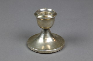 A silver dwarf candlestick of simple design 3"
