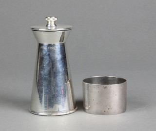 A contemporary silver pepper mill of tapered form 4", a ditto napkin ring