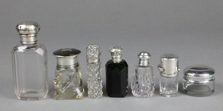 A silver and tortoiseshell mounted toilet bottle (f), 6 other mounted bottles and jars