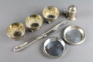 3 Victorian silver repousse table salts on ball feet, 2 dishes, a pepper and a silver bladed butter knife