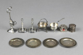 A collection of 19th Century Dutch silver miniatures comprising 4 dinner plates, a pair of candlesticks, a box and cover, a saucepan, a cooking pot, octagonal box and candle snuffers and stand