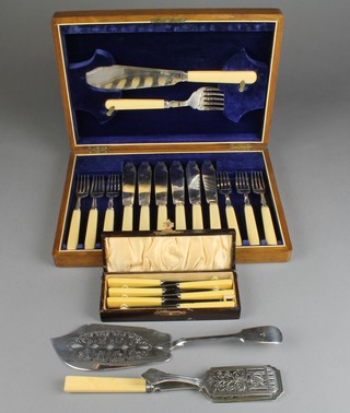 A cased canteen of silver plated fish eaters and servers for 6 and minor plated items