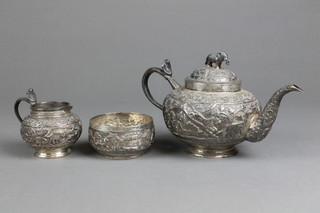 An Indian silver 3 piece baluster bachelor's teaset, the repousse decoration with extensive landscape views of figures and animals, approximately 16 ozs