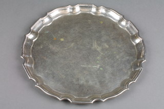 A Chinese silver salver with Chippendale rim 8", approx 14 ozs 
