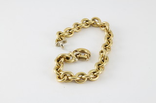 An 18ct fancy link hollow bracelet, approx 15.5 grams