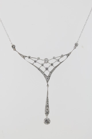 An 18ct white gold Art Deco style diamond set open necklace with tapered drop on an 18ct white gold chain 