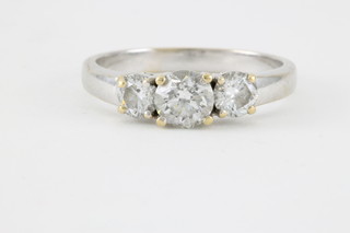 An 18ct white gold 3 stone brilliant cut diamond ring, the centre stone approx .5ct, flanked by 2 stones each approx .4ct 