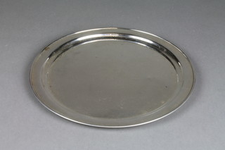 A Sterling silver circular tray of plain form 11", approx. 15 ozs 
