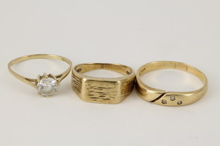 A 15ct gold ring, 2 9ct gold ditto, gross 7 grams 