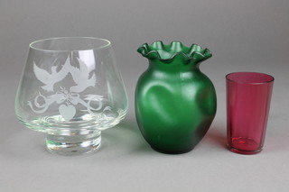 A Victorian cranberry glass beaker 4", an Art Nouveau green glass vase and an etched tulip vase decorated with lovebirds 5" 