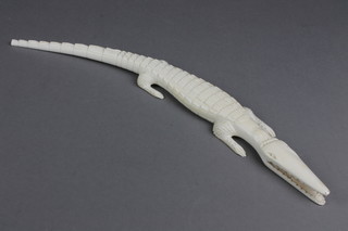 An African carved ivory figure of an alligator 16"