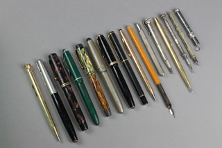 A silver and niello propelling pencil, 2 others and minor fountain pens