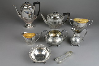 An Edwardian silver plated repousse and chased 4 piece tea set and 4 other items