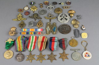 A WWI pair to TS/7640 CPL.A.S. Reed A.S.C., minor WWII medals and badges