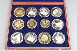 A cased set of 12 commemorative medallions