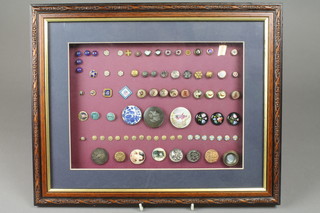 A framed collection of Victorian and later buttons including silver and piquet tortoiseshell, Japanese Satsuma, bright cut steel etc