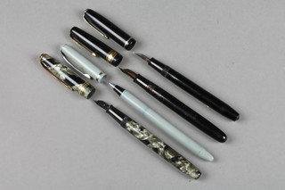 4 fountain pens - a marbled Wyvern Ambassador, a black Watermans, a black Conway Stuart 75 and a Platinum 
