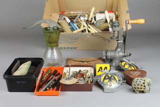 A collection of curios including old spectacles, AA badges, cutlery, minor pens, corkscrews etc