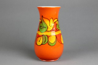 A 1960's Poole baluster vase with waisted neck, the orange ground with band of stylised leaves 9" 