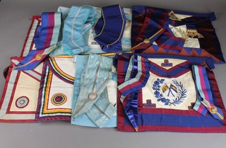 A quantity of Masonic aprons and collars