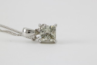 An 18ct white gold Princess cut single stone pendant, approx. 0.76ct on an 18ct white gold chain