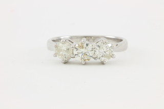 An 18ct white gold claw set 3 stone diamond ring, approx 1.12ct