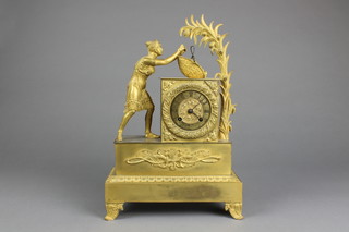 A 19th Century French striking mantel clock contained in a gilt metal case with a figure harvesting pomegranates, with silk suspension movement 