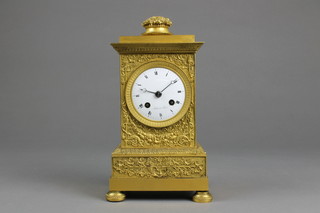 An early 19th Century French 8 day striking clock with enamelled dial and Roman numerals contained in a gilt metal case, by Alibert A Paris 