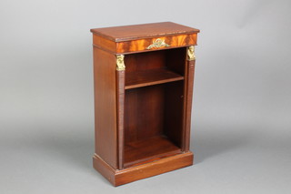 An Empire style mahogany bookcase with adjustable shelf having Egyptian style columns to the sides 32"h x 20"w x 11 1/2"d
