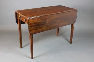 A Victorian mahogany Pembroke table fitted a frieze drawer, raised on square tapering supports with ebony stringing 28 1/2h, when closed 19 1/2", when opened 28 1/2"