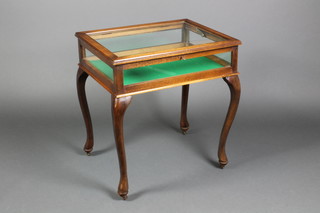 A rectangular mahogany bijouterie table raised on cabriole supports 25 1/2"h x 23"w x 18"d 