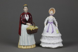 A Coalport figure - The Apple Woman 8" and a Royal Worcester figure - Crinoline 7"