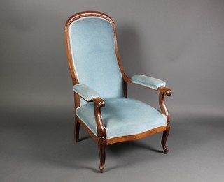 A Victorian mahogany show frame open arm chair upholstered in blue material