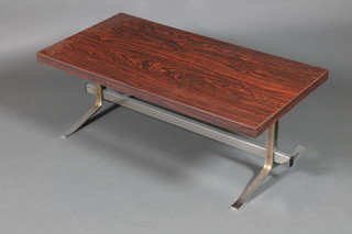 A 1960's chrome and faux rosewood rectangular coffee table 14"h x 39 1/2"w x 20"d 