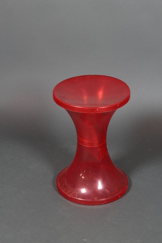 A French "designer" waisted red plastic stool marked 01760 Nurieux Ref 169, 8"h x 12" diam. 