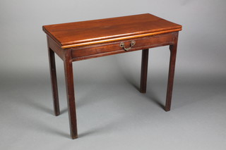 A Georgian oak rectangular tea table fitted a drawer raised on square tapering supports 29"h x 36"w x 17 1/2" when closed, 35 1/2" when open 