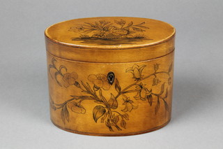 A 19th Century oval fruitwood tea caddy with simple floral penwork decoration 4 1/2"h x 6"w x 4"d