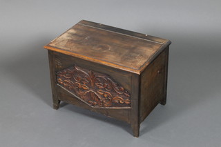A Victorian pine and oak trunk with hinged lid on square tapering supports 16"h x 22"w x 14"d 