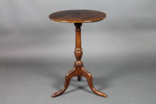 A Victorian circular mahogany wine table, raised on a pillar and tripod base 26 1/2"h x 18"w
