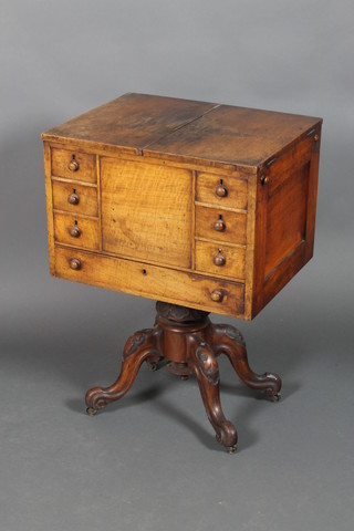 A Victorian square walnut work box with hinged lid revealing a fitted interior, the base fitted 4 short drawers above 1 long drawer, raised on pillar and tripod base 31"h x 21 1/2"h x 17"d 