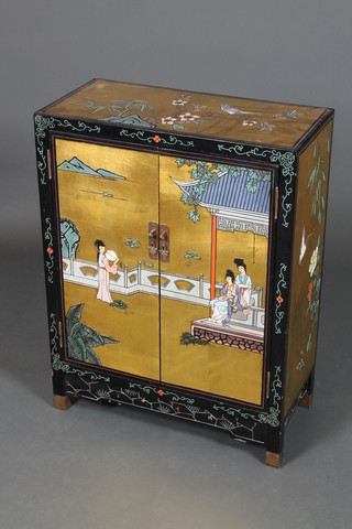 A Chinese gold lacquered cabinet, the interior fitted a shelf and enclosed by a panelled door 30"h x 23"w x 11"d 