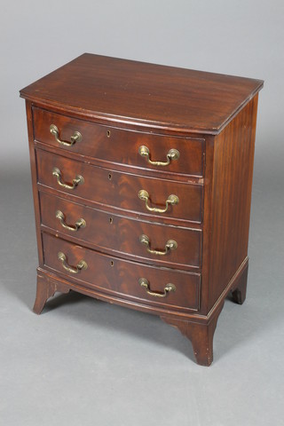 A Georgian style mahogany bow front chest of 4 long drawers with brass swan neck drop handles, raised on splayed bracket feet 29"h x 23"w x 16"d 