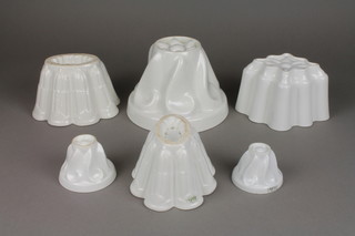 A Victorian white glazed domed jelly mould 7" and 5 others