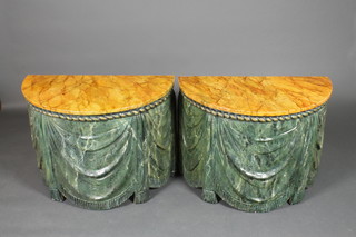 A pair of faux marble and stone draped consoles 23 1/2"h x 32"w x 17"d