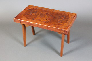 A rectangular teak and embossed leather stool, the top decorated oil drummers 15"h x 23"w x 14"d 