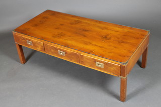 A rectangular military style yew coffee table fitted 3 short drawers with brass banded corners 16"h x 48"w x 22"d 