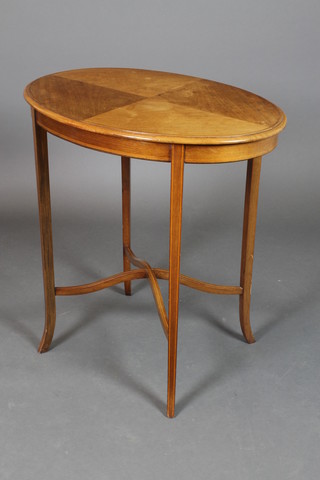 An Edwardian oval inlaid mahogany occasional table raised on square tapering supports with X framed stretcher 29"h x 28"w x 20"d 