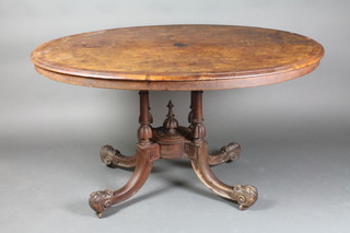 A Victorian oval figured walnut snap top Loo table, raised on 4 turned columns with platform base, spade feet 30"h x 54"w x 41"d